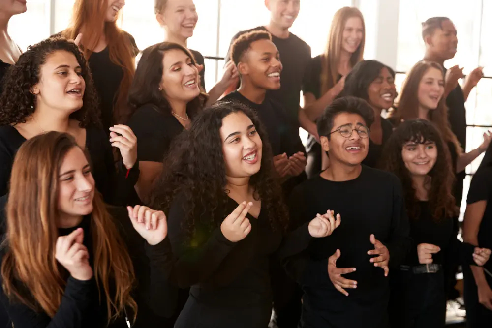 Male,And,Female,Students,Singing,In,Choir,At,Performing,Arts